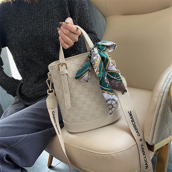 purses us bag women new embossed fashion portable bucket single shoulder women's bag
purses us bag women new embossed fashion portable bucket single shoulder women's bag