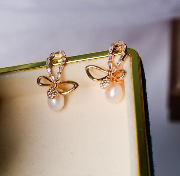 14k gold plating zircon butterfly ear studs natural freshwater pearl earrings white lady/girl fashion wedding jewelry, Golden;silver
14k gold plating zircon butterfly ear studs natural freshwater pearl earrings white lady/girl fashion wedding jewelry, Golden;silver