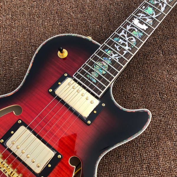 2022 flower inlaid abalone fingerboard electric guitar, maple double f hollow body same of picture
2022 flower inlaid abalone fingerboard electric guitar, maple double f hollow body same of picture