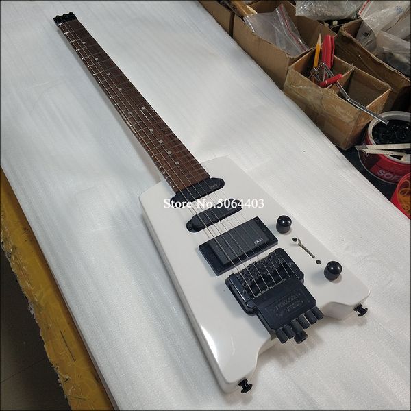 factory direct sales of white 6-string portable headless electric guitar single double pickup black accessories vibrato bridge postage
factory direct sales of white 6-string portable headless electric guitar single double pickup black accessories vibrato bridge postage