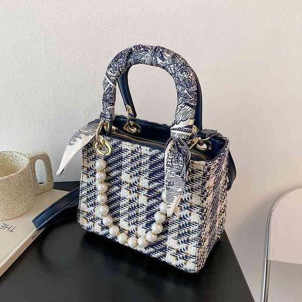 minority design female spring and summer 2022 new fashion pearl chain portable single shoulder messenger princess bag luxury designer
minority design female spring and summer 2022 new fashion pearl chain portable single shoulder messenger princess bag luxury designer