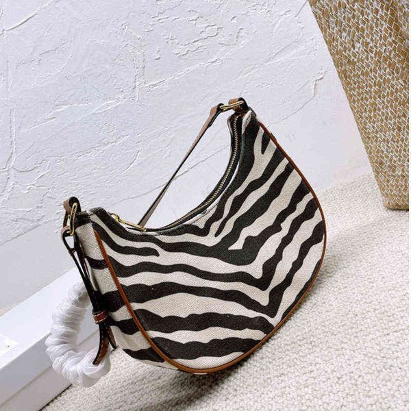 arc de triomphe zebra armpit autumn and winter new minority french high-grade feeling one shoulder portable crescent bag female 220420
arc de triomphe zebra armpit autumn and winter new minority french high-grade feeling one shoulder portable crescent bag female 220420