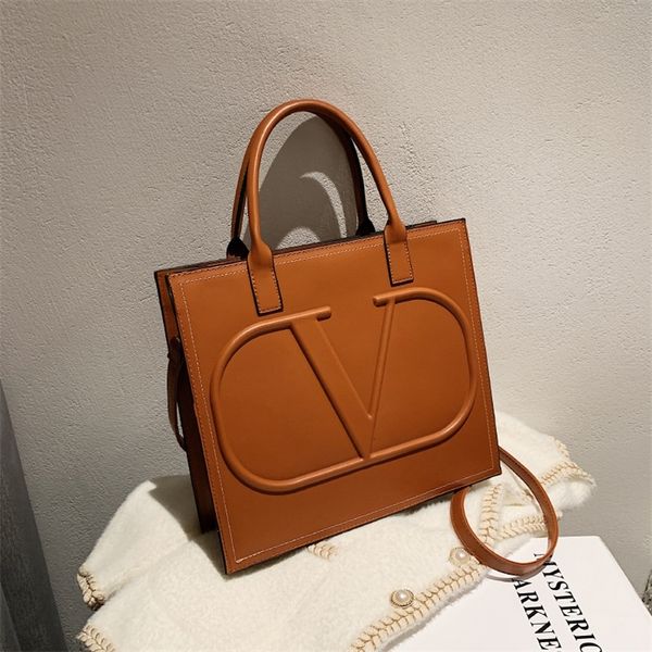 big new women's bag letter indentation large capacity tote bag oblique cross bag portable
big new women's bag letter indentation large capacity tote bag oblique cross bag portable