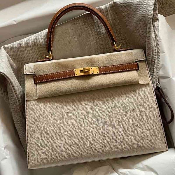 2022 designer female herme women handbags high-capacity advanced sense of foreign style kelys mommy leather portable commuter bag cz
2022 designer female herme women handbags high-capacity advanced sense of foreign style kelys mommy leather portable commuter bag cz