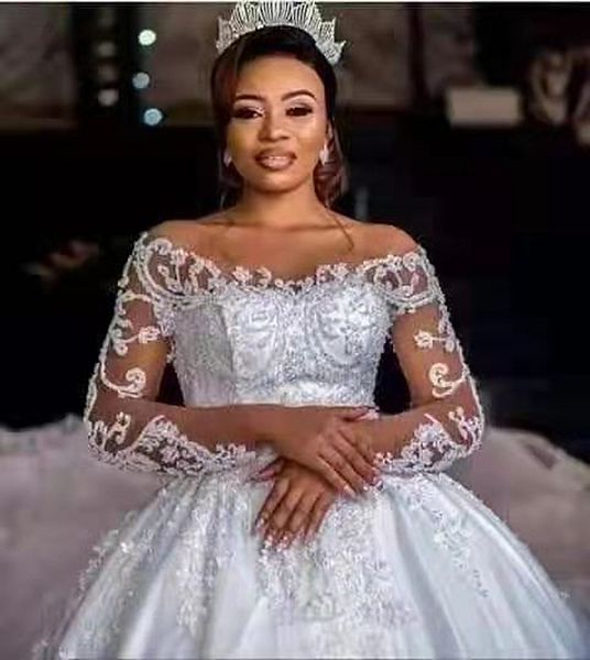 pearls beaded ball gown luxury wedding dresses with long sleeves lace applique beads illusion scoop neck button chapel bridal dress custom m, White
pearls beaded ball gown luxury wedding dresses with long sleeves lace applique beads illusion scoop neck button chapel bridal dress custom m, White