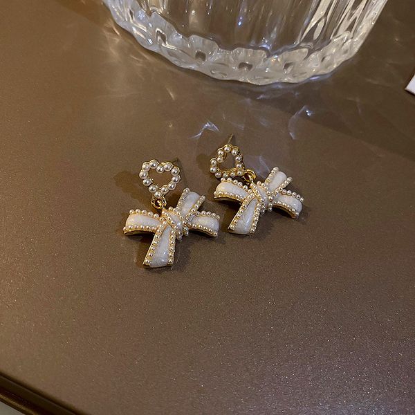925 silver needle pearl bowknot earrings korean fashion simple design earrings graceful personality online influencer eardrop women, Golden
925 silver needle pearl bowknot earrings korean fashion simple design earrings graceful personality online influencer eardrop women, Golden