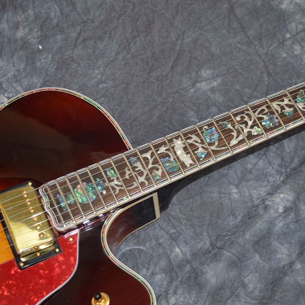 chinese electric guitar colourful binding flower inleys hollow body jazz 335 thick body
chinese electric guitar colourful binding flower inleys hollow body jazz 335 thick body