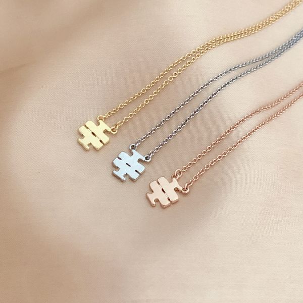 curved crosses earrings & necklace set in gold silver & pink brass