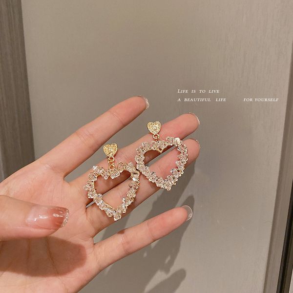 925 silver needle summer crystal portrait hollow love heart earrings female european and american ins high-profile earrings niche french ear, Golden
925 silver needle summer crystal portrait hollow love heart earrings female european and american ins high-profile earrings niche french ear, Golden