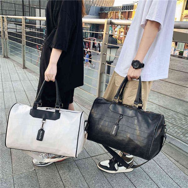 leather travel bag large capacity hand luggage duffle bags fashion shoulder crossbody bag weekend package 220505
leather travel bag large capacity hand luggage duffle bags fashion shoulder crossbody bag weekend package 220505