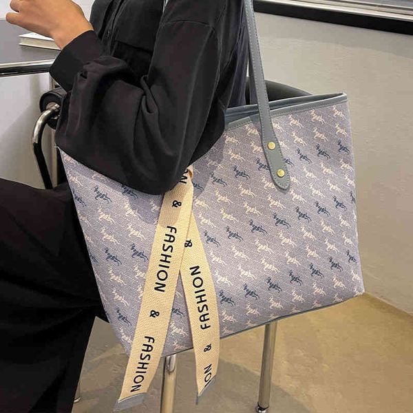 60% off wholesale 2022 spring summer new versatile high-capacity tote bag women's high-grade texture fashion shoulder trend letter prin
60% off wholesale 2022 spring summer new versatile high-capacity tote bag women's high-grade texture fashion shoulder trend letter prin