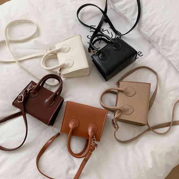 pure handbag women's new fashion hand carrying girl cross shoulder simple portable
pure handbag women's new fashion hand carrying girl cross shoulder simple portable