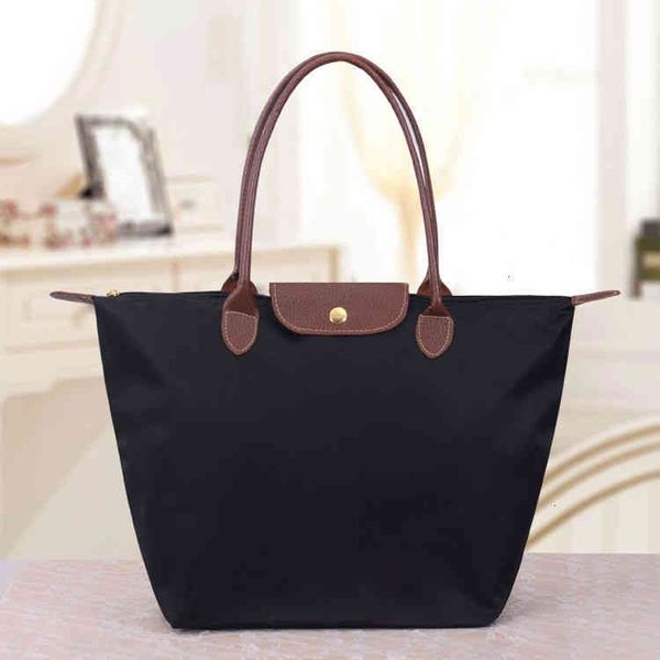 fashion women's handbags new large portable dumpling shoulder oxford cloth waterproof mommy bag
fashion women's handbags new large portable dumpling shoulder oxford cloth waterproof mommy bag