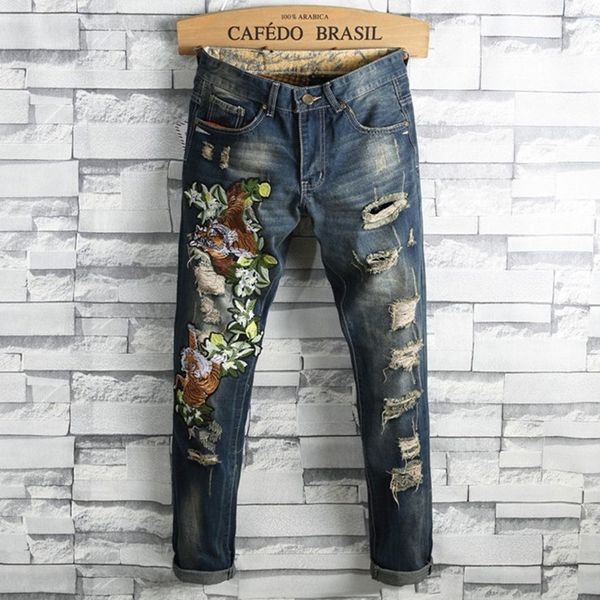 autumn new jeans european american style fashion hipster ripped straight tubeembroidered tiger slim casual blue pants
autumn new jeans european american style fashion hipster ripped straight tubeembroidered tiger slim casual blue pants