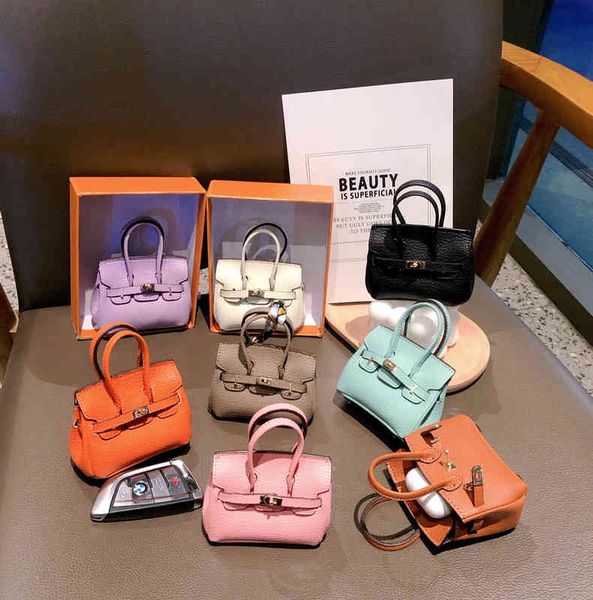 h family mini cute bag pendant airpods headset key storage pendant women's hand accories
h family mini cute bag pendant airpods headset key storage pendant women's hand accories