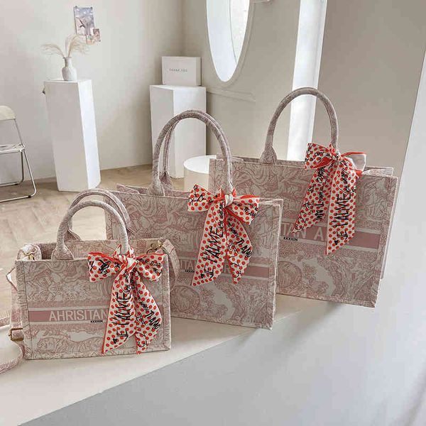 2022 new designer handbags canvas capacity single printed hand bow scarf tote
2022 new designer handbags canvas capacity single printed hand bow scarf tote