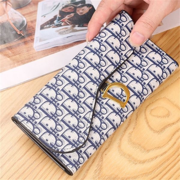 new european and d-brand women's purse long student version zero wallet card foreskin clip design purses online, Red;black
new european and d-brand women's purse long student version zero wallet card foreskin clip design purses online, Red;black
