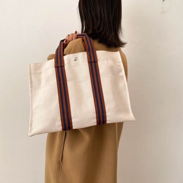 canvas shopping bag eco-friendly reusable foldable shoulder bags practical large capacity blank shopping pouch
canvas shopping bag eco-friendly reusable foldable shoulder bags practical large capacity blank shopping pouch