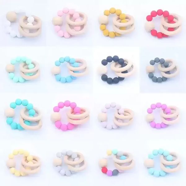 baby teether rings set food grade beech wood teething ring soothers chew toys shower play round wooden bead silicone teethers sxmy21
baby teether rings set food grade beech wood teething ring soothers chew toys shower play round wooden bead silicone teethers sxmy21