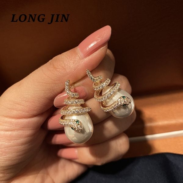 new korean gold color mad snake earrings pearl curved snake-shaped surround exquisite for women luxury simple earring jewelry, Golden
new korean gold color mad snake earrings pearl curved snake-shaped surround exquisite for women luxury simple earring jewelry, Golden