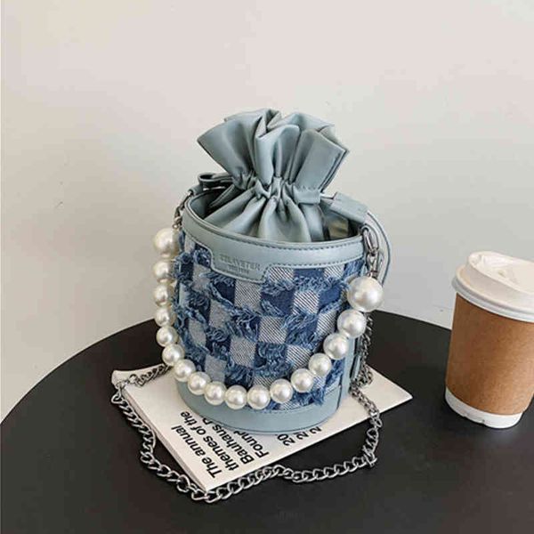 spring pearl handle denim bucket chain mini shoulder crossbody bags for women trends 2022 fashion brand designer ladies handbags y220421
spring pearl handle denim bucket chain mini shoulder crossbody bags for women trends 2022 fashion brand designer ladies handbags y220421