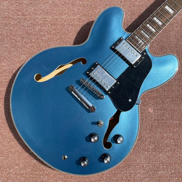 metal blue hollow jazz 335 electric guitar, chrome hardware, rosewood fingerboard electric guitar
metal blue hollow jazz 335 electric guitar, chrome hardware, rosewood fingerboard electric guitar