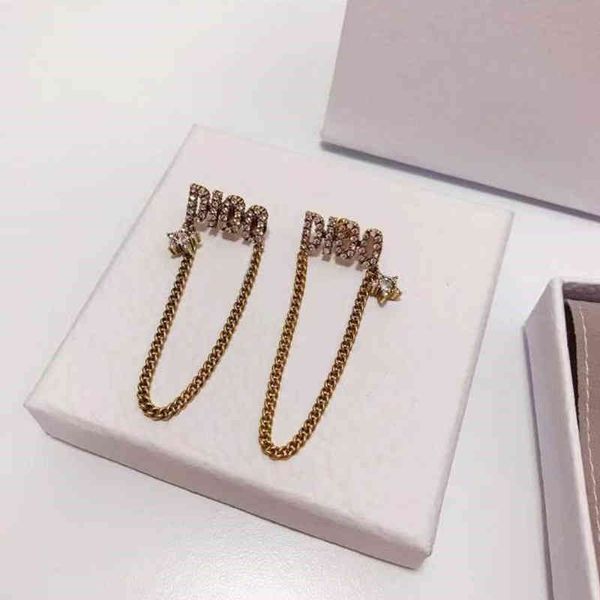 version tassel letter diamond studded earrings women's light luxury star earrings, Golden
version tassel letter diamond studded earrings women's light luxury star earrings, Golden