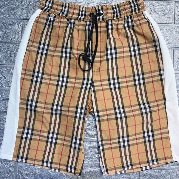 men's shorts designer 2022 new men's fashion color blocking grid five point shorts selling recommendation of summer iwby, White;black
men's shorts designer 2022 new men's fashion color blocking grid five point shorts selling recommendation of summer iwby, White;black