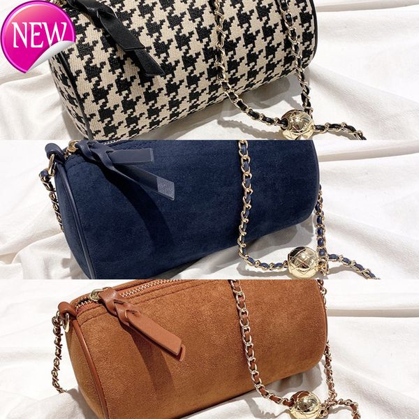 50% new fashion lattice canvas cylinder trend ball chain single shoulder diagonal span small girl female luxury designer handbags 
50% new fashion lattice canvas cylinder trend ball chain single shoulder diagonal span small girl female luxury designer handbags