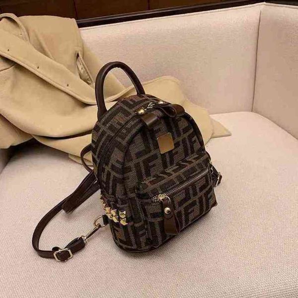 design luxury fashion bags canvas brown rivet backpack large capacity backpackwomen's
design luxury fashion bags canvas brown rivet backpack large capacity backpackwomen's
