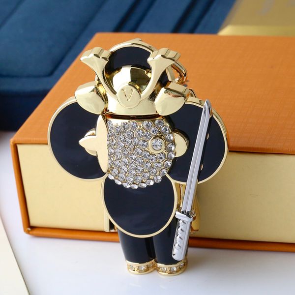 fashion keychain luxury designer stylish sun-flower doll pendant keychains keys buckle mens womens keys ornaments 22051406cy, Silver
fashion keychain luxury designer stylish sun-flower doll pendant keychains keys buckle mens womens keys ornaments 22051406cy, Silver