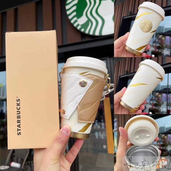 starbucks new year of the tiger cup platinum tiger pattern retro rivet cup cover accompanying stainless steel insulated coffee cup
starbucks new year of the tiger cup platinum tiger pattern retro rivet cup cover accompanying stainless steel insulated coffee cup