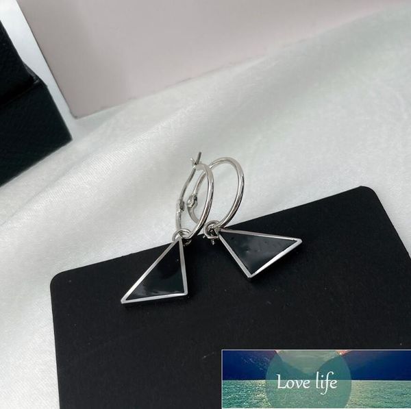 new simple and fashionable geometric iron plate metal inverted triangle logo earrings with european and american design, Silver
new simple and fashionable geometric iron plate metal inverted triangle logo earrings with european and american design, Silver