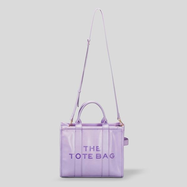 2022 new tote bag letter printing brand women's designer crossbody shoulder bags large capacity spring and summer handbags
2022 new tote bag letter printing brand women's designer crossbody shoulder bags large capacity spring and summer handbags