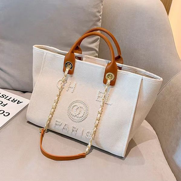 classic designer luxury beach bags tote label pearl evening bag portable large capacity female fashion canvas handbag brand women handbags l
classic designer luxury beach bags tote label pearl evening bag portable large capacity female fashion canvas handbag brand women handbags l