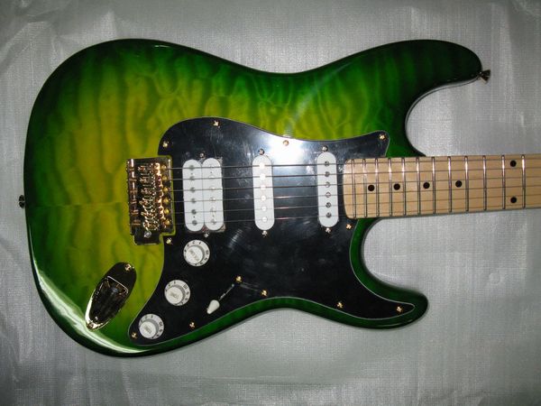 green st electric guitar body mahogany a flame maple with black pick guard color white
green st electric guitar body mahogany a flame maple with black pick guard color white
