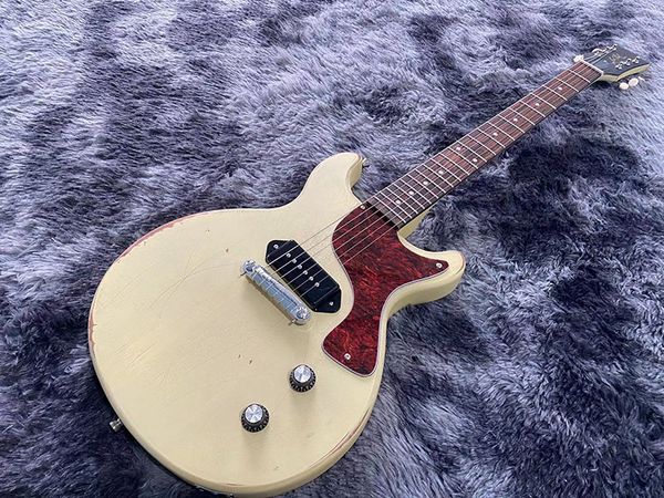 chinese electric guitar junior milk white color 1 p90 pickup handmade heavry relic mahogany body and neck
chinese electric guitar junior milk white color 1 p90 pickup handmade heavry relic mahogany body and neck