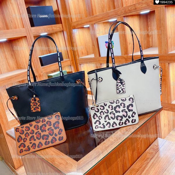 wild at heart never mm tote bag m58525 oversized embossed monograms empreinte leather with leopard print zip pouch designers luxury handbag
wild at heart never mm tote bag m58525 oversized embossed monograms empreinte leather with leopard print zip pouch designers luxury handbag