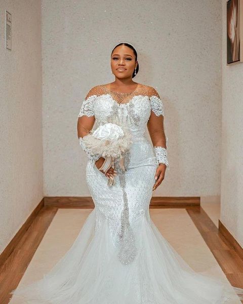 2022 luxury plus size african mermaid wedding dresses jewel neck illlusion lace crystal beads wedding dress long sleeves arabic bridal gowns, White
2022 luxury plus size african mermaid wedding dresses jewel neck illlusion lace crystal beads wedding dress long sleeves arabic bridal gowns, White