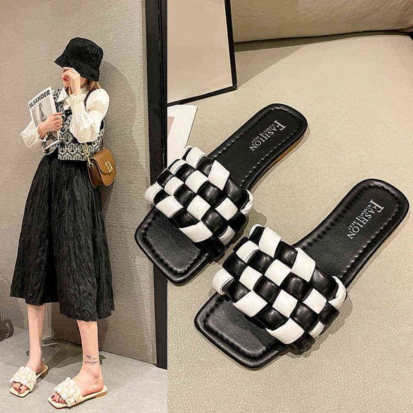 in the summer of 2022, woven checkered flat bottomed women's beach slippers are worn outside. they versatile, gentle and, Black
in the summer of 2022, woven checkered flat bottomed women's beach slippers are worn outside. they versatile, gentle and, Black