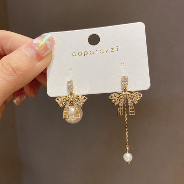 925 silver needle korean fashion new asymmetric pearl diamond bow earrings long earrings wholesale, Golden
925 silver needle korean fashion new asymmetric pearl diamond bow earrings long earrings wholesale, Golden