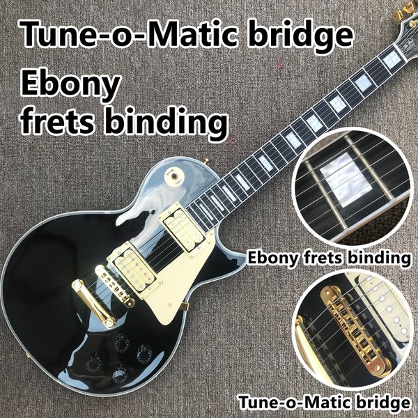 black electric guitar, ebony fingerboard, tune-o-matic bridge, frets binding, solid mahogany body
black electric guitar, ebony fingerboard, tune-o-matic bridge, frets binding, solid mahogany body