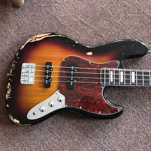 4-string handmade retro jazz electric bass guitar pickups sunburst color bass gitaar with relics
4-string handmade retro jazz electric bass guitar pickups sunburst color bass gitaar with relics