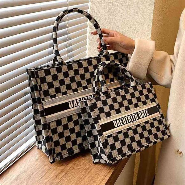spring and summer capacity women's high sense chessboard hand commuter fashion tote clearance outlet sale
spring and summer capacity women's high sense chessboard hand commuter fashion tote clearance outlet sale
