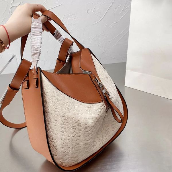 2022 designer bag women loews hammock deformation cowhide backpack handbags single shoulder
2022 designer bag women loews hammock deformation cowhide backpack handbags single shoulder