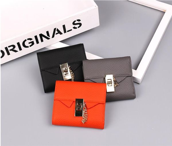 new leather personalized buckle lady's short purse fashion cowhide women's wallet, Red;black
new leather personalized buckle lady's short purse fashion cowhide women's wallet, Red;black
