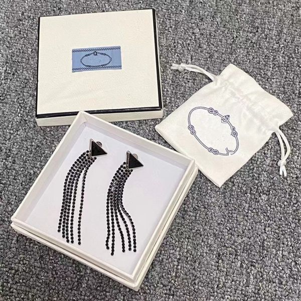 pra european american street fashion inverted triangle letter dangles pendant earrings men and women cold wind silver ear studs
pra european american street fashion inverted triangle letter dangles pendant earrings men and women cold wind silver ear studs