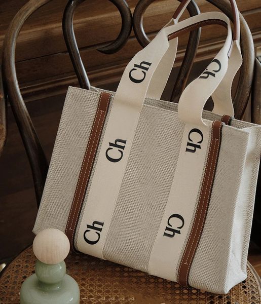 5a quality women handbags woody tote shopping bag handbag high canvas hobo fashion linen large beach bags luxury designer travel crossbody s
5a quality women handbags woody tote shopping bag handbag high canvas hobo fashion linen large beach bags luxury designer travel crossbody s