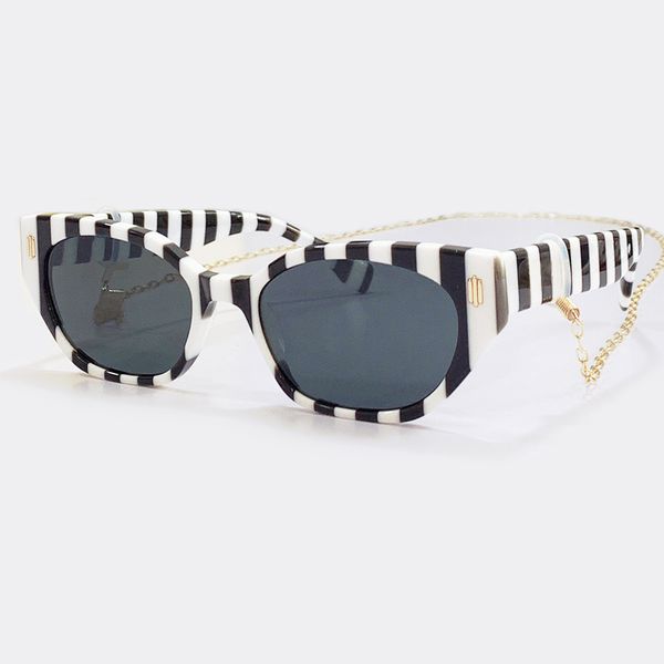 2022 new acetate oval shades sunglasses female fashion trend uv400 eyewear personalized glasses with antiskid chain, White;black
2022 new acetate oval shades sunglasses female fashion trend uv400 eyewear personalized glasses with antiskid chain, White;black