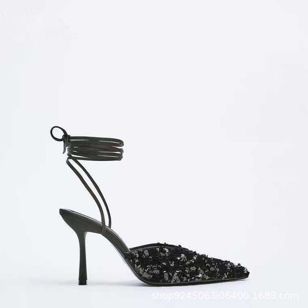 zar spring and autumn new high heels black blue beads with exposed heels muller shoes pointed bandage thin heel single women's shoes
zar spring and autumn new high heels black blue beads with exposed heels muller shoes pointed bandage thin heel single women's shoes